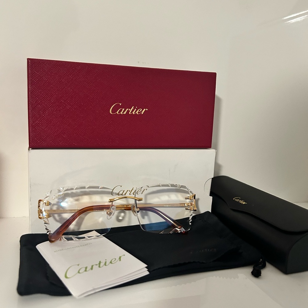 Cartier Women's Gold and Brown Glasses